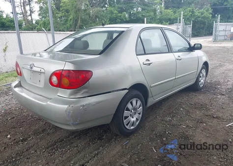 2003 Toyota Corolla Le z USA, uszkodzony, nr VIN JTDBR32EX30047579